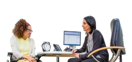 A woman talking with a doctor